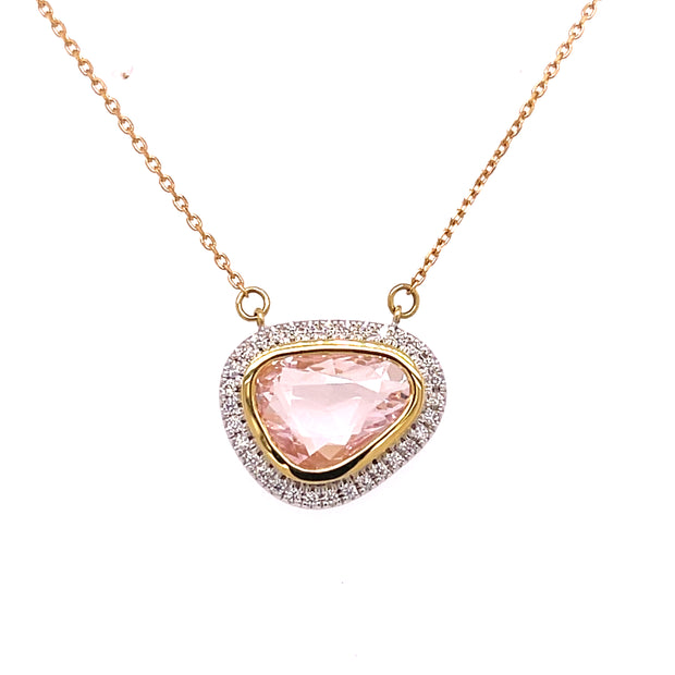 A pink sapphire and diamond necklace.