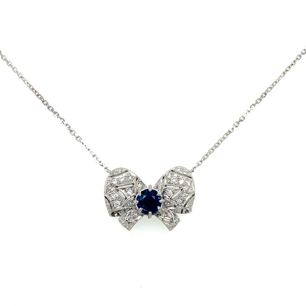 Stunning sapphire and diamond bow motif pendant necklace.