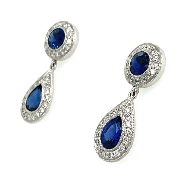 A detailed side view of the sapphire drop earrings.