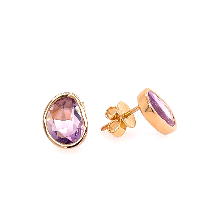 Natural pink sapphire slice earrings set in 18K rose gold.