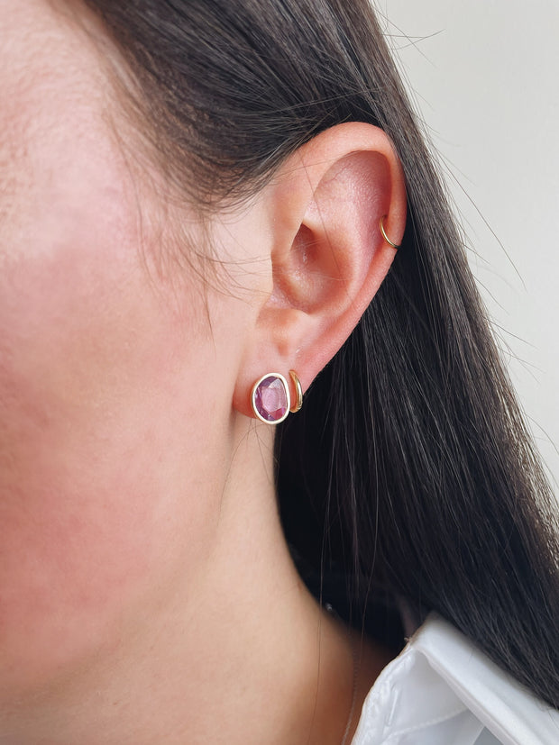 Natural pink sapphire slice earrings shown on model.