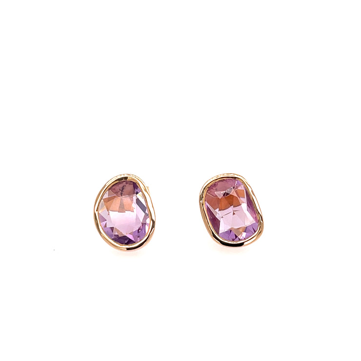 A pair of pink sapphire slice earrings set in 18K rose gold.