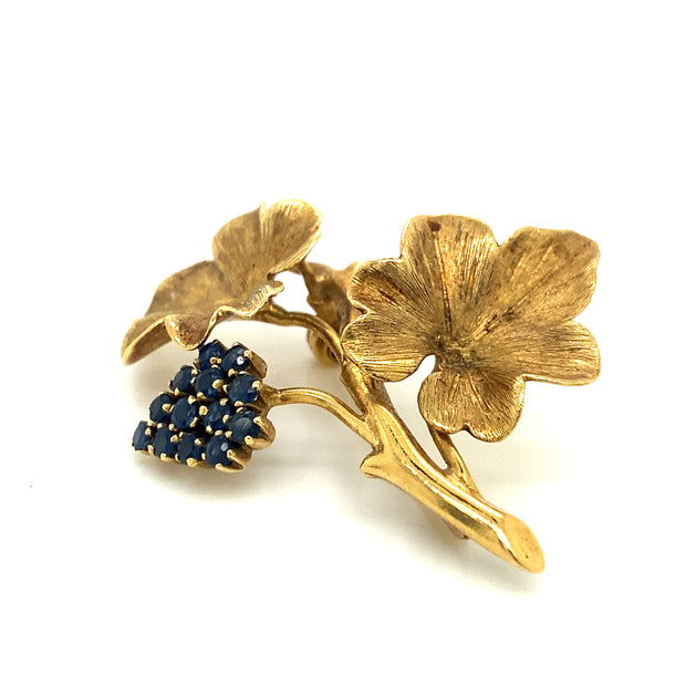 Angled view highlighting the dimensional craftsmanship and lifelike detail of the vine motif.