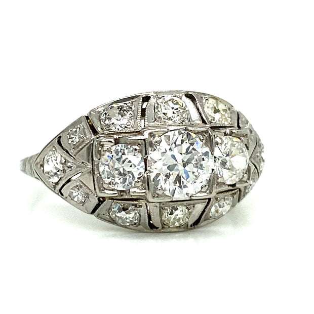 Art Deco ring is set in 18K white gold with delicate milgrain detailing. 