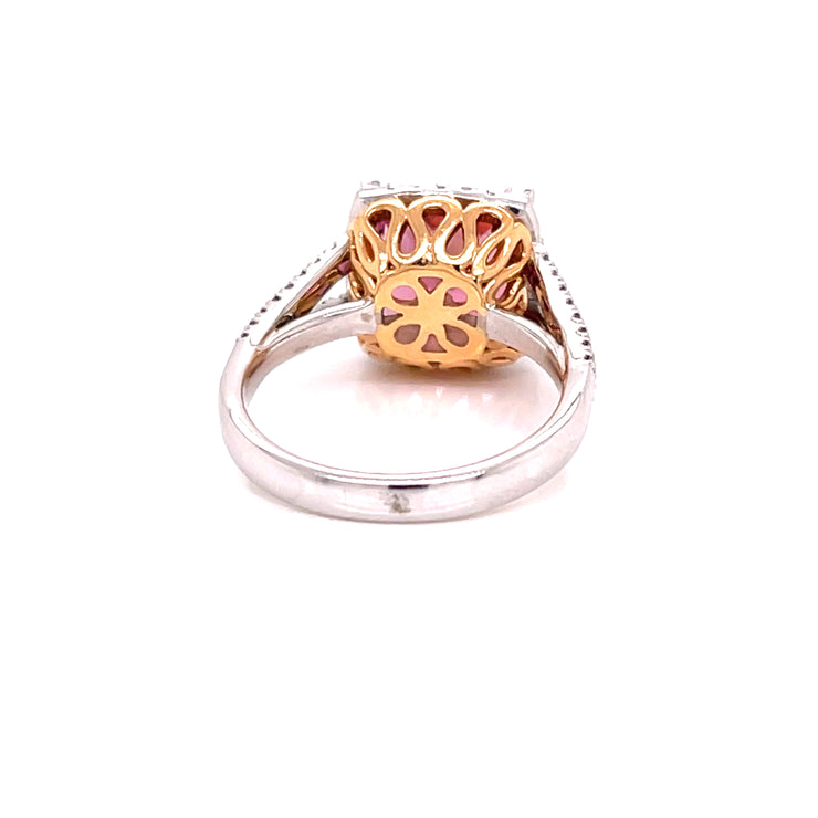 Two-tone tourmaline and diamond halo ring shown fromthe back.