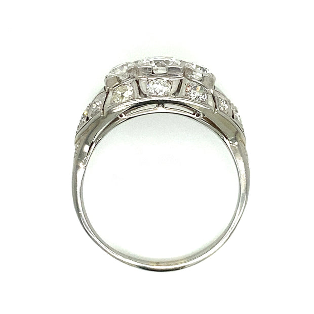 Stunning craftsmenship in detailed milgrain to showcase this Deco Diamond Ring