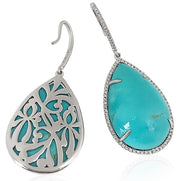 Close-up of large 47.95 carat pear-shaped cabochon turquoise in white gold