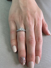 Worn on hand to show the ring’s timeless shape and proportions.

