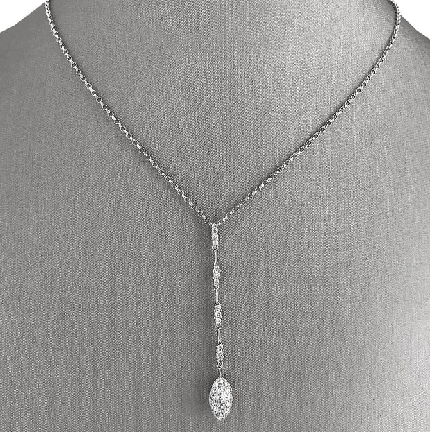 Crafted in 18K white gold, the design features 0.40 carats total weight of round brilliant cut diamonds.