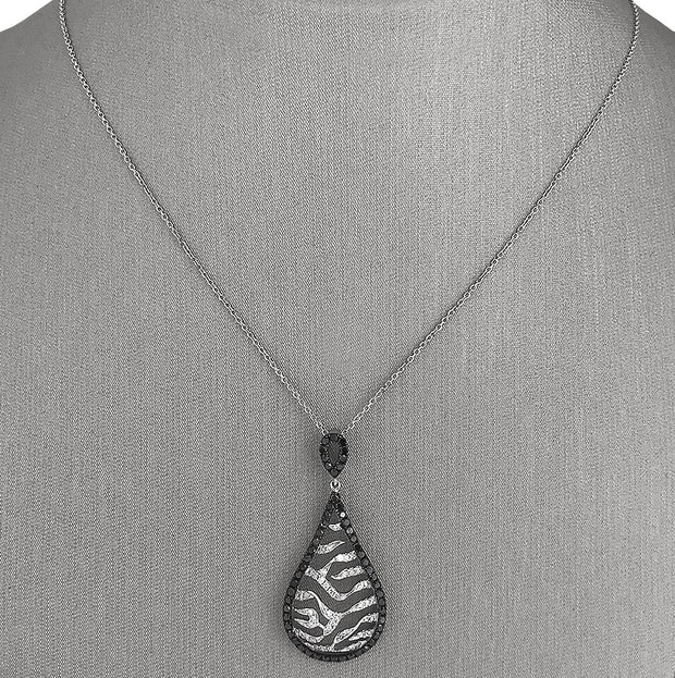 Crafted in 14K white gold with a bold zebra-inspired design.