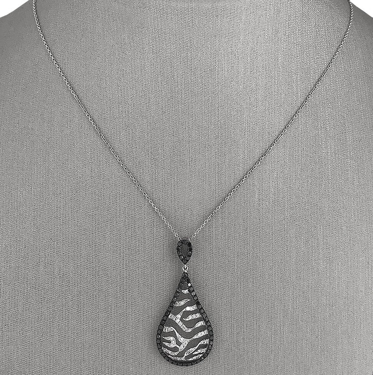 Crafted in 14K white gold with a bold zebra-inspired design.