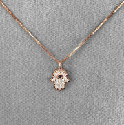 Bezel-set blue sapphire center for a vivid pop of color.