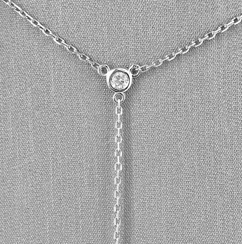 0.08 carats total weight of round brilliant cut diamonds.