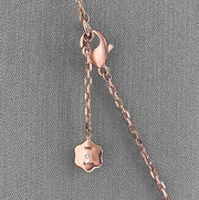 The Daniella lapis motif and diamond pendant