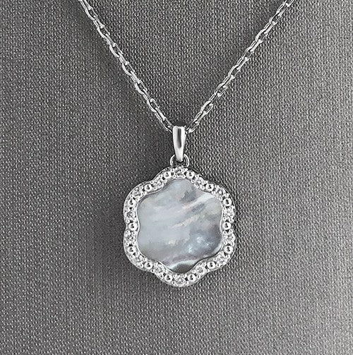 The Daniella MOP motif and diamond pendant