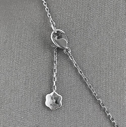 The Daniella MOP motif and diamond pendant