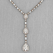 A close detail on the diamonds cascading down the y-designed necklace.