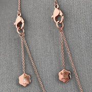 The Daniella Six open motif rose gold necklace