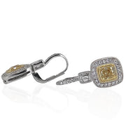 A pair of 18k white and yellow gold diamond drop lever back earrings, set with fancy yellow diamonds and emerald cut diamonds.