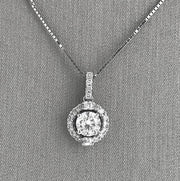 Closer detailing af the diamond halo pendant necklace.