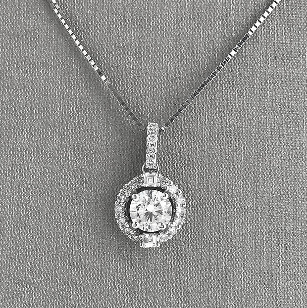 Closer detailing af the diamond halo pendant necklace.