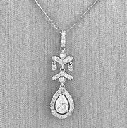 Elegant natural diamond drop pendant necklace.