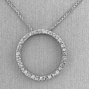 Diamond circle pendant set in luminous 14K white gold.