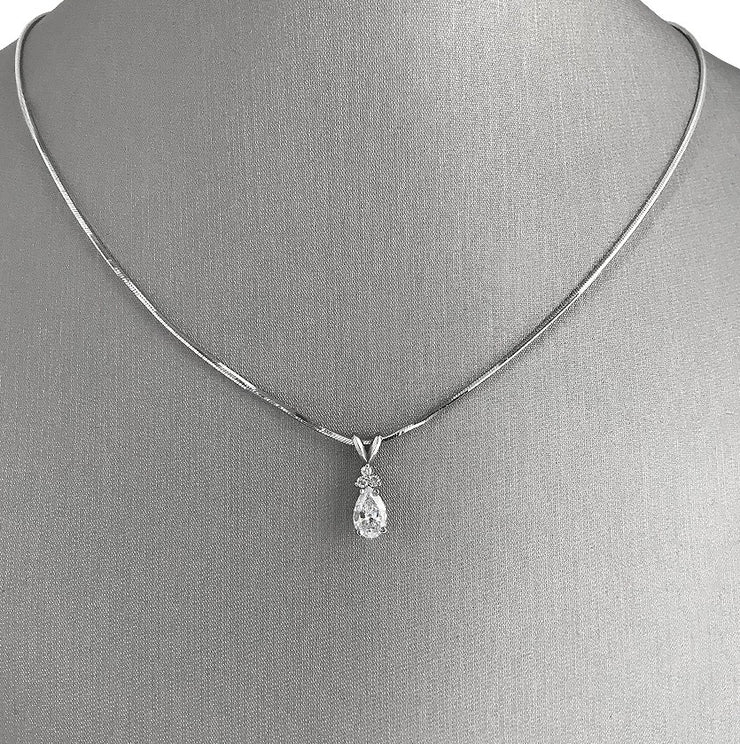 Diamond pendant shown on a delicate chain.