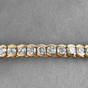 Bezel set yellow gold Diamond tennis bracelet