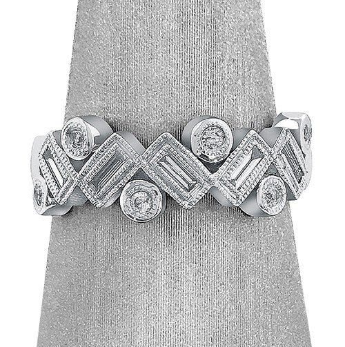 Shown here 0.33 carats total weight of baguette and round brilliant cut diamonds.