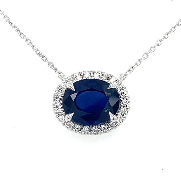 East–west sapphire pendant with diamond halo in 18K white gold