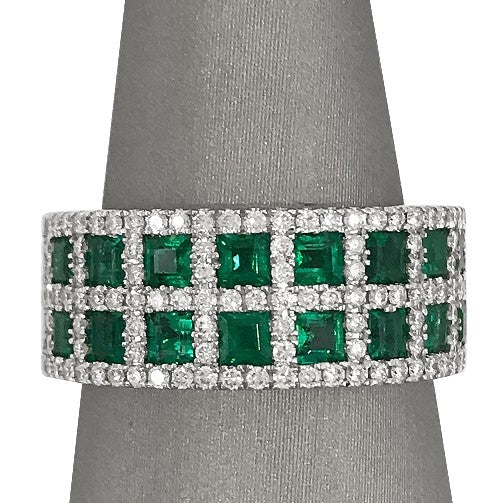 Featuring two rows of emeralds.