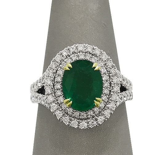 Emerald with double halo diamond ring