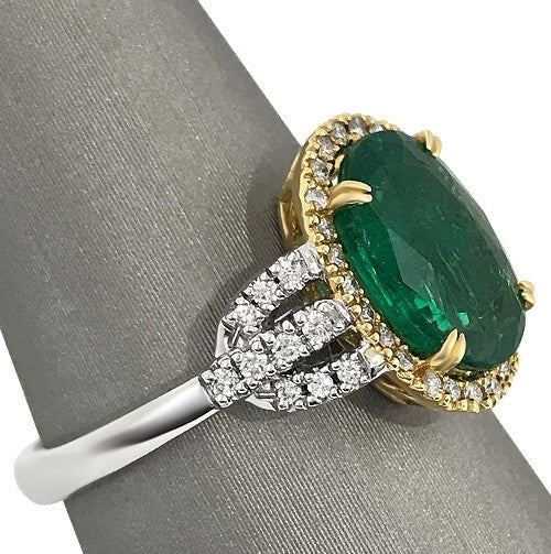 Oval Emerald diamond two tone ring