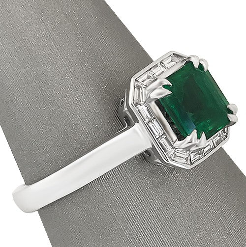 Emerald and Diamond Baguette Halo ring