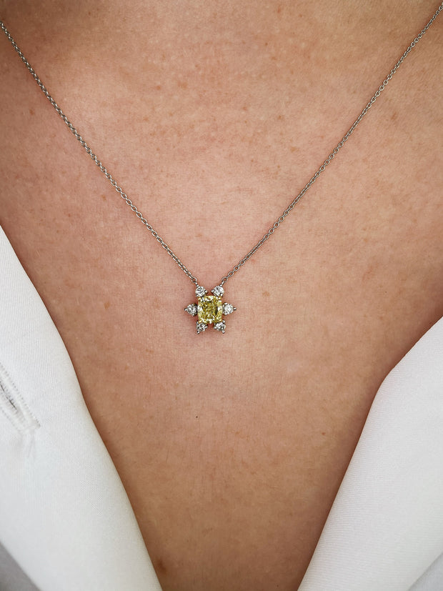 Starburst yellowdiamond pendant on model.