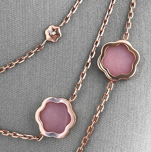 Shown here in detail the opal slices and .01ct diamond accent.