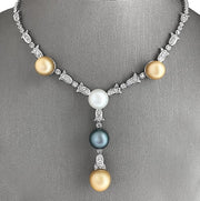 Lariat necklace with natural multi-color pearls and round brilliant cut diamond accents