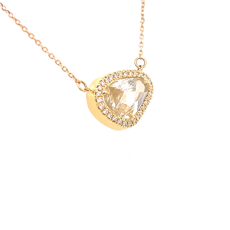 Natural sapphire slice with yellow hues and diamond halo on 18K gold chain