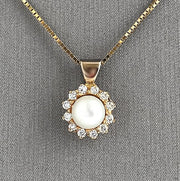 Pearl and Diamond halo Yellow Gold Pendant