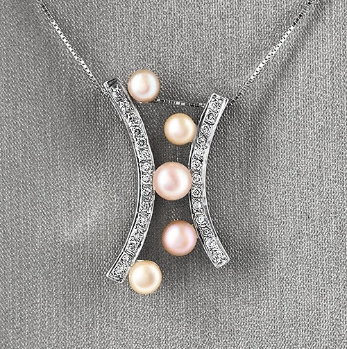 14kT white gold pearl and diamond pendant