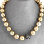 A South Sea pearl necklace with an accented with black pave diamonds bead.