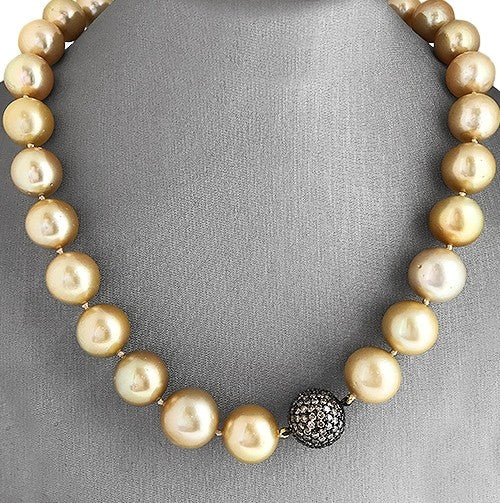 A South Sea pearl necklace with an accented with black pave diamonds bead.