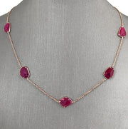 A natural ruby slice necklace in 18K rose gold.