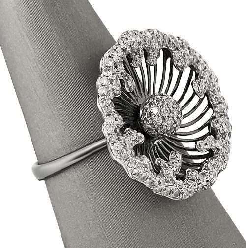 Shown here from the side Crafted in 18k white gold with bold black rhodium detailing.
