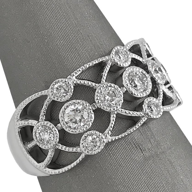 A side view of the filigree and diamond band.