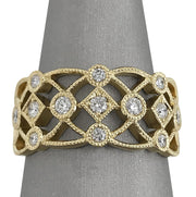 A closer front view of the yellow gold filigree band.