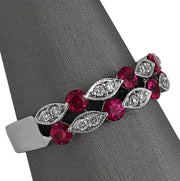 A side view of the ruby and diamond band.
