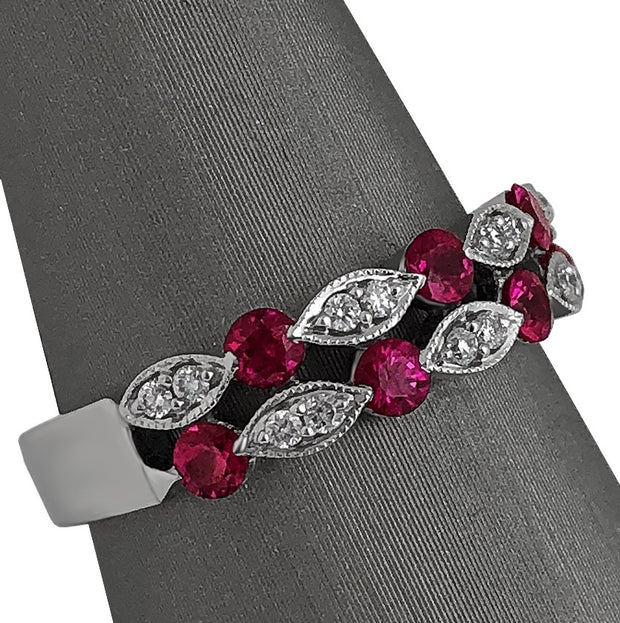 A side view of the ruby and diamond band.