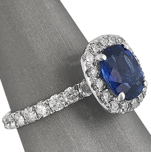 Oval Blue Sapphire and Diamond Halo Ring